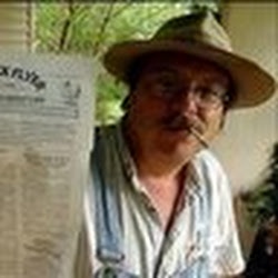 Prairie radical Mike Caddell, founder/editor of the Fightin' Cock Flyer and host of Radio Free Kansas