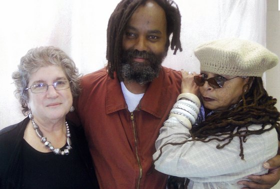 Mumia, off death row but fighting to escape life in prison, with attorney Rachel Wolkenstein and his wife Wadiya Jamal Mumia, off death row but fighting to escape life in prison, with attorney Rachel Wolkenstein and his wife Wadiya Jamal